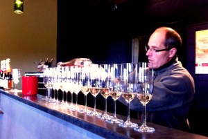 Pouring L'Acadie sparkling Prestige Brut for Uncork Nova Scotia Wine Tours.